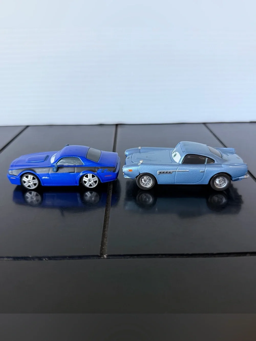 Disney Pixar Cars 2 Rod Torque Redline and Finn McMissile 1:55 diecast